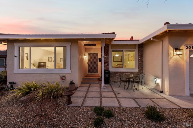 exterior space with a patio area