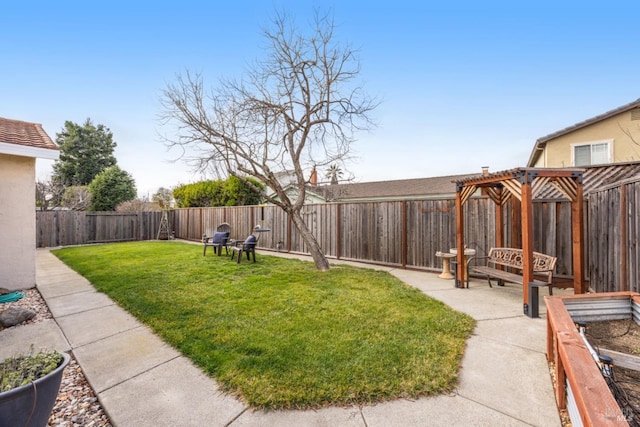 view of yard with a patio area and a pergola