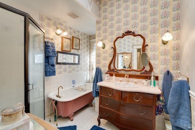 bathroom with vanity, tile patterned floors, and independent shower and bath