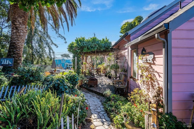 view of yard with a patio and a pergola