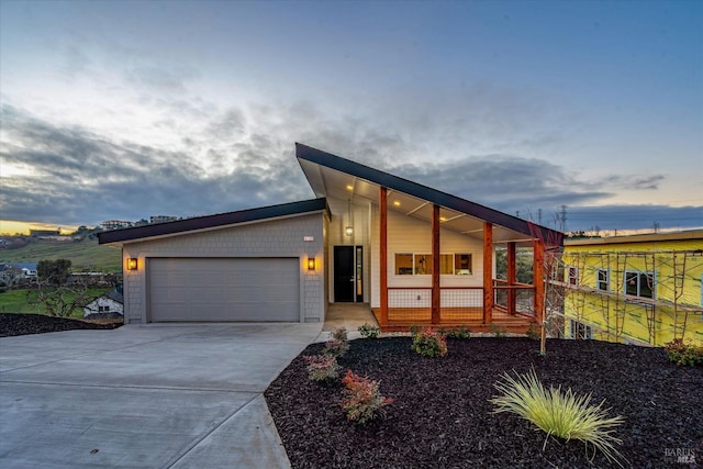 view of front of property with a garage