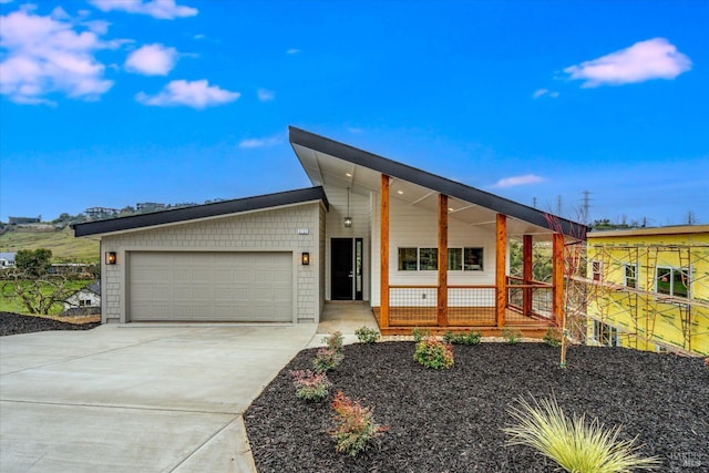 view of front of property with a garage