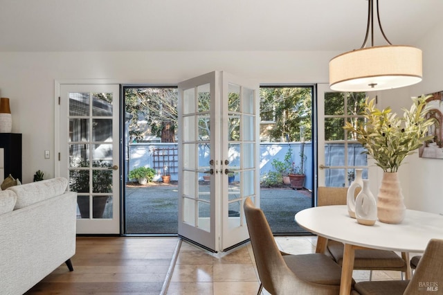 doorway to outside with hardwood / wood-style floors and french doors