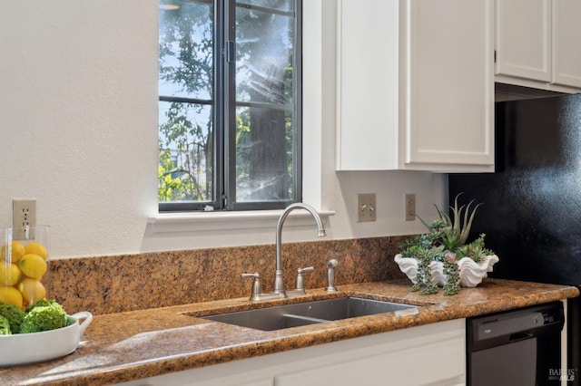 kitchen with sink, white cabinets, and black appliances