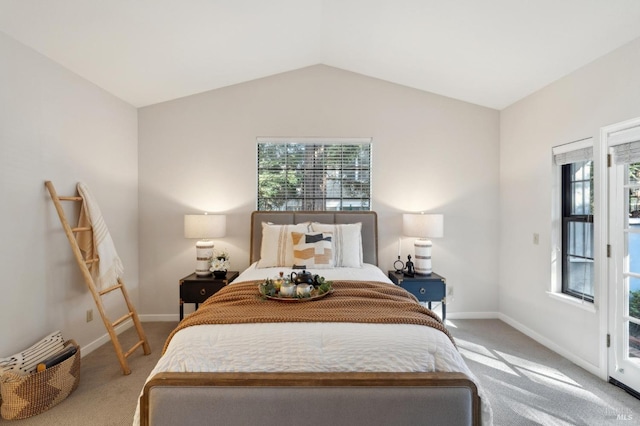 bedroom with carpet and lofted ceiling