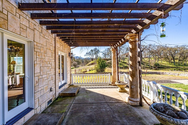 view of patio featuring a pergola