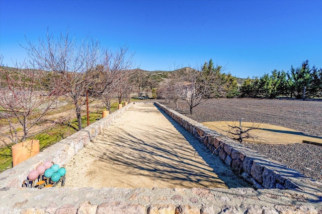 view of property's community with a mountain view