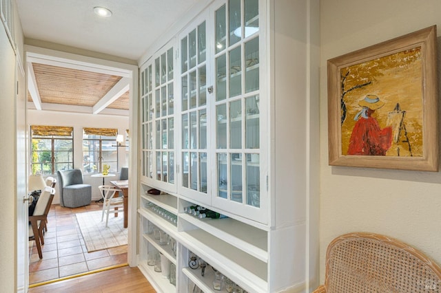 corridor featuring hardwood / wood-style flooring