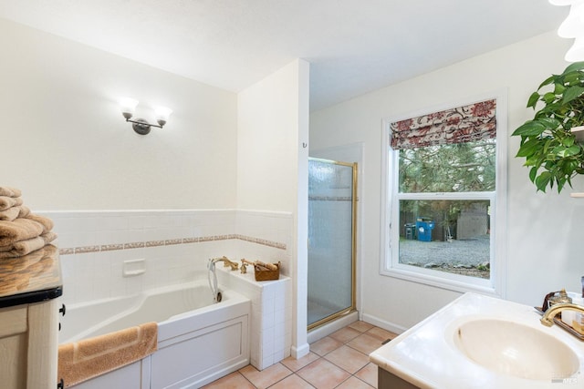 bathroom featuring vanity, separate shower and tub, and tile patterned flooring