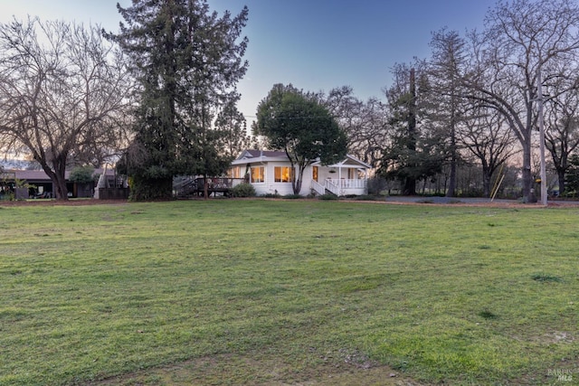 view of yard with a porch