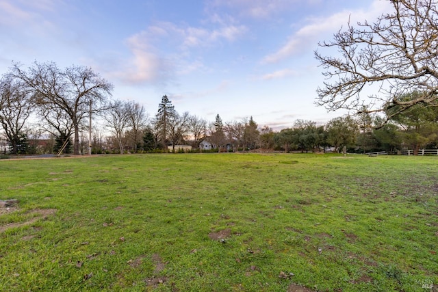 view of yard with a rural view