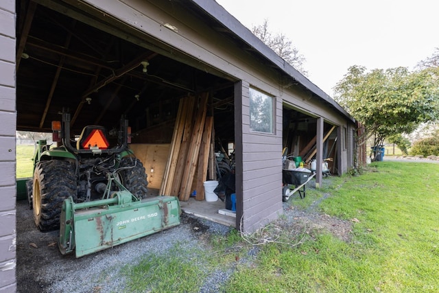 exterior space with an outbuilding and a yard