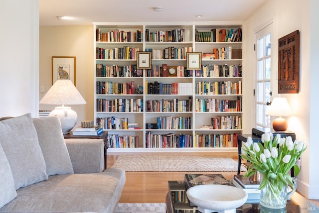 living area with wood-type flooring