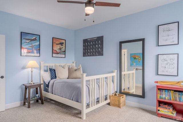 carpeted bedroom featuring ceiling fan