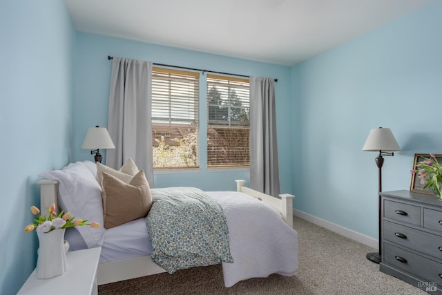 bedroom with light colored carpet