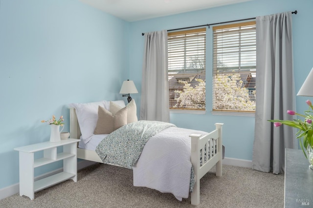 bedroom with light carpet