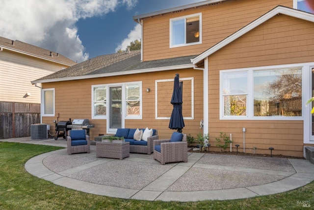 rear view of property featuring central AC, an outdoor living space, and a patio