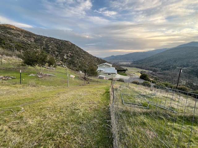 mountain view featuring a rural view