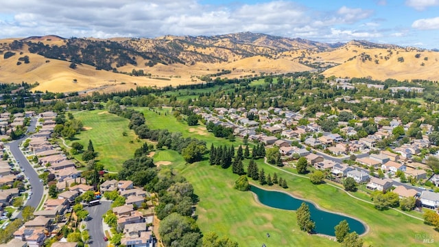 birds eye view of property featuring a water and mountain view and a residential view