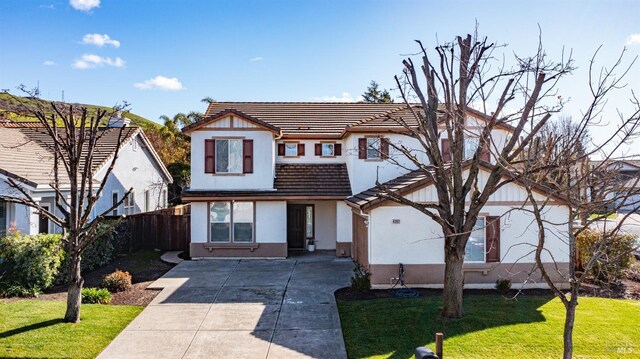 view of front of property with a front lawn