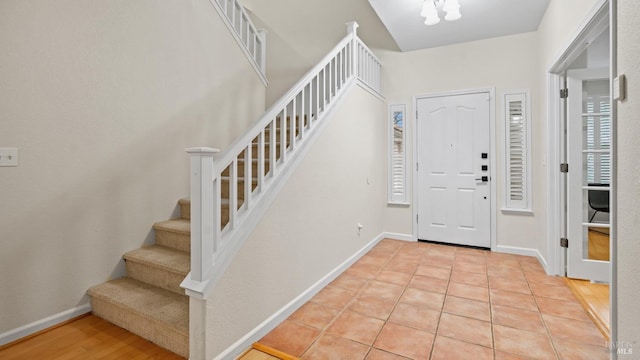 entryway featuring light tile patterned floors