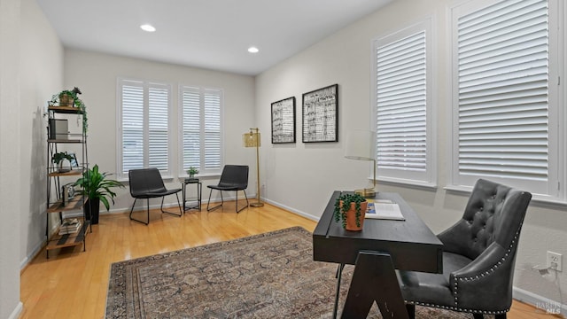 office area with baseboards, wood finished floors, and recessed lighting
