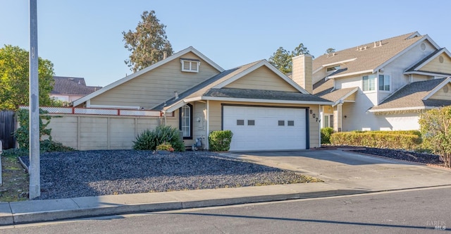 view of front of home with a garage