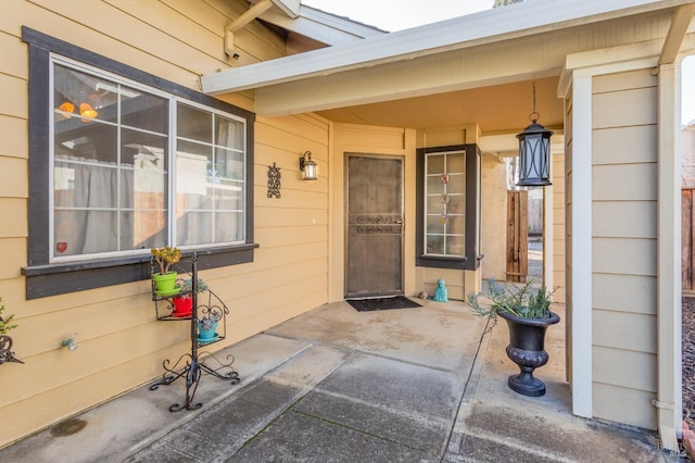 doorway to property featuring a patio area