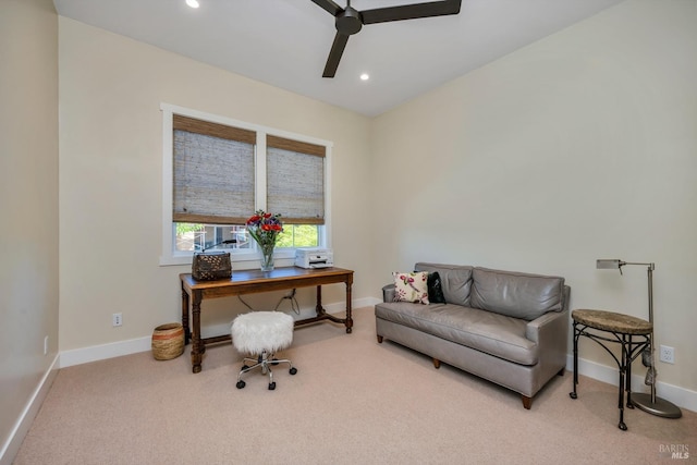 carpeted office with ceiling fan