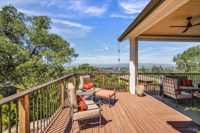 wooden terrace with ceiling fan