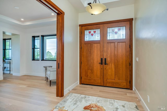 entrance foyer with light hardwood / wood-style floors