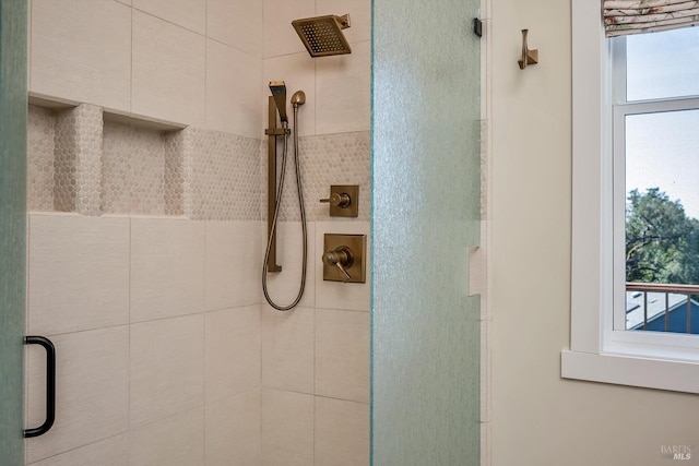 bathroom featuring walk in shower