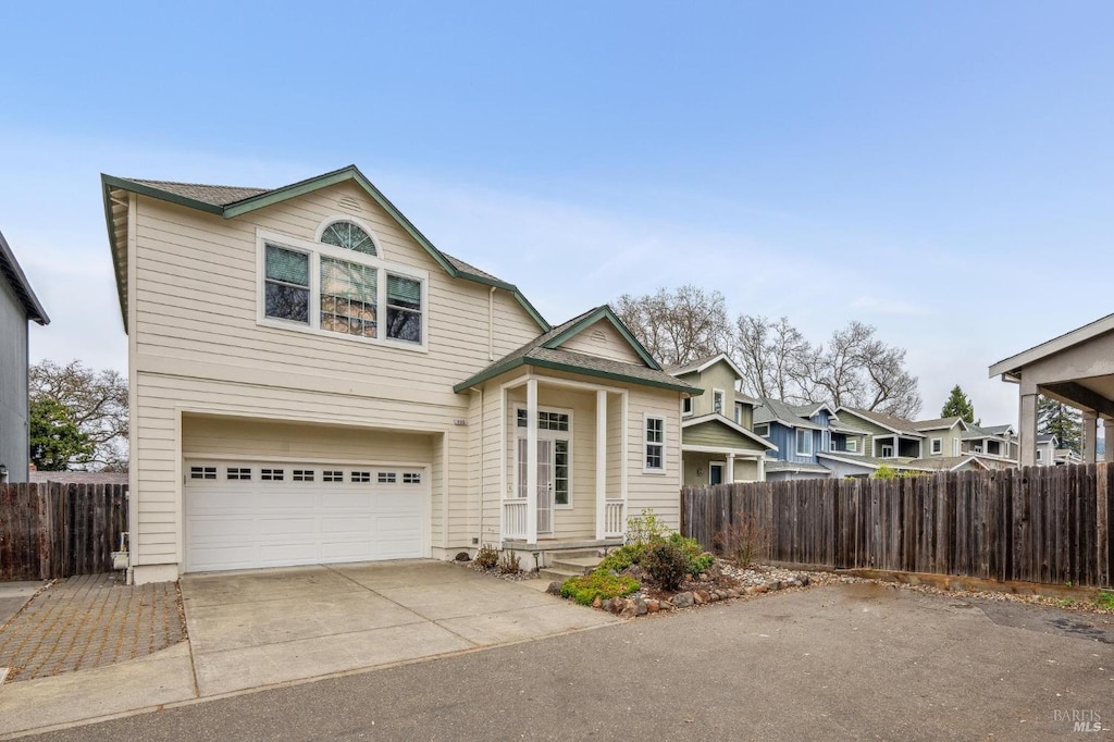 view of front of property featuring a garage