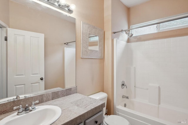 full bathroom featuring vanity, toilet, and shower / bathing tub combination