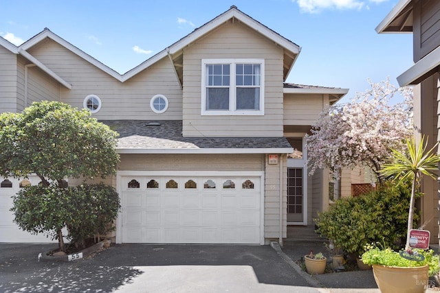 front facade with a garage