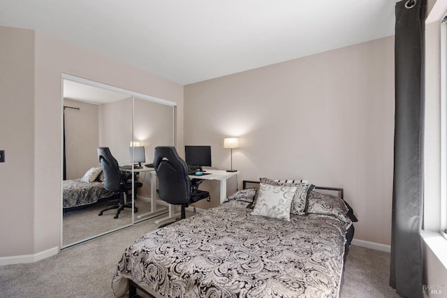 carpeted bedroom with a closet