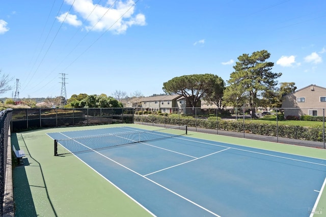 view of tennis court featuring basketball court