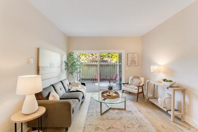 57 Lakeshore Ct, Richmond, CA 94804 - living area with light wood finished floors and baseboards