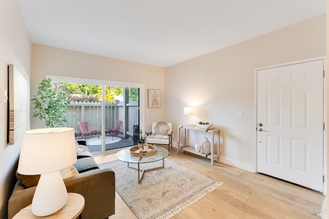 57 Lakeshore Ct, Richmond, CA 94804 - living room featuring light wood-type flooring and baseboards