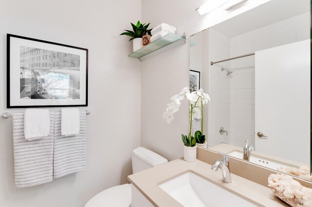57 Lakeshore Ct, Richmond, CA 94804 - bathroom with toilet, walk in shower, and vanity