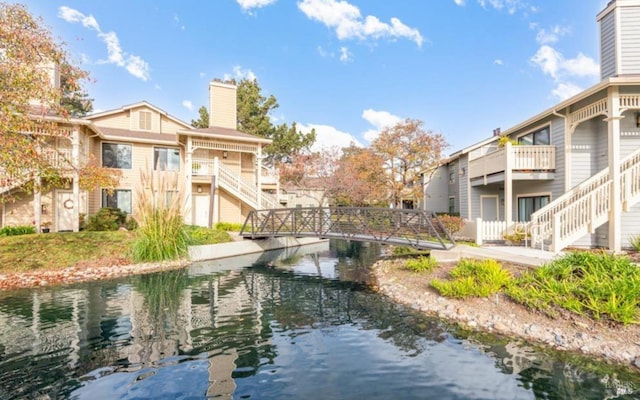 57 Lakeshore Ct, Richmond, CA 94804 - view of community with stairs and a water view