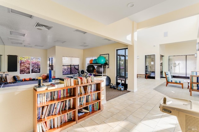 57 Lakeshore Ct, Richmond, CA 94804 - interior space featuring light tile patterned flooring and visible vents