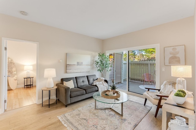 57 Lakeshore Ct, Richmond, CA 94804 - living area with baseboards and light wood finished floors