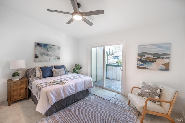 bedroom featuring light carpet, access to outside, ceiling fan, and vaulted ceiling