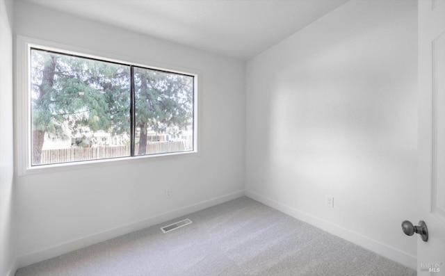 empty room with carpet flooring