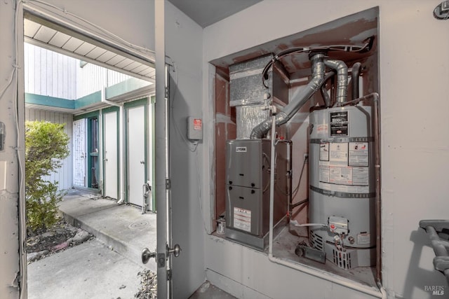 utility room with secured water heater