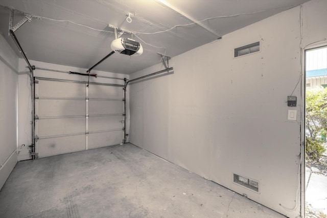 garage with a garage door opener