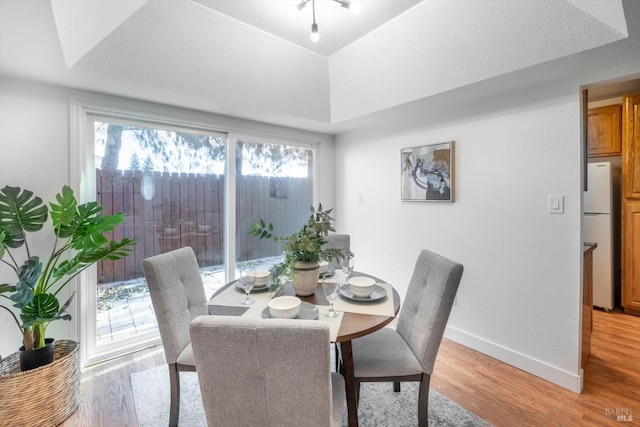 dining room with light wood-type flooring