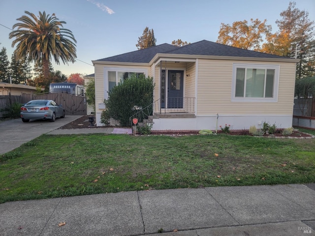 view of front of home with a yard