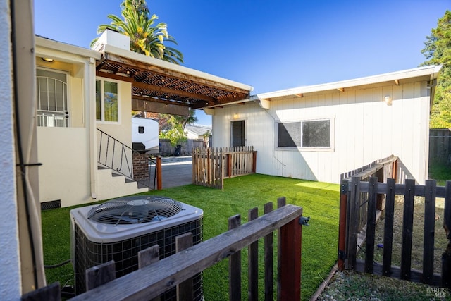 view of yard featuring central AC